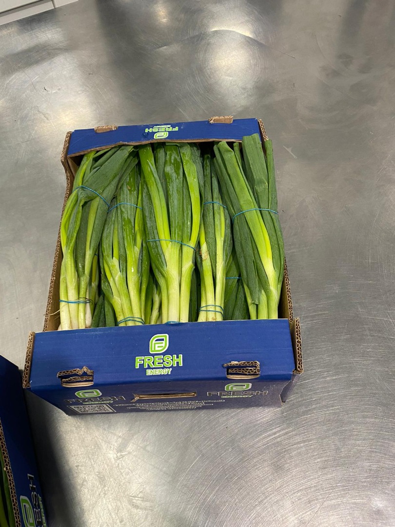 Venta de cebolletas frescas